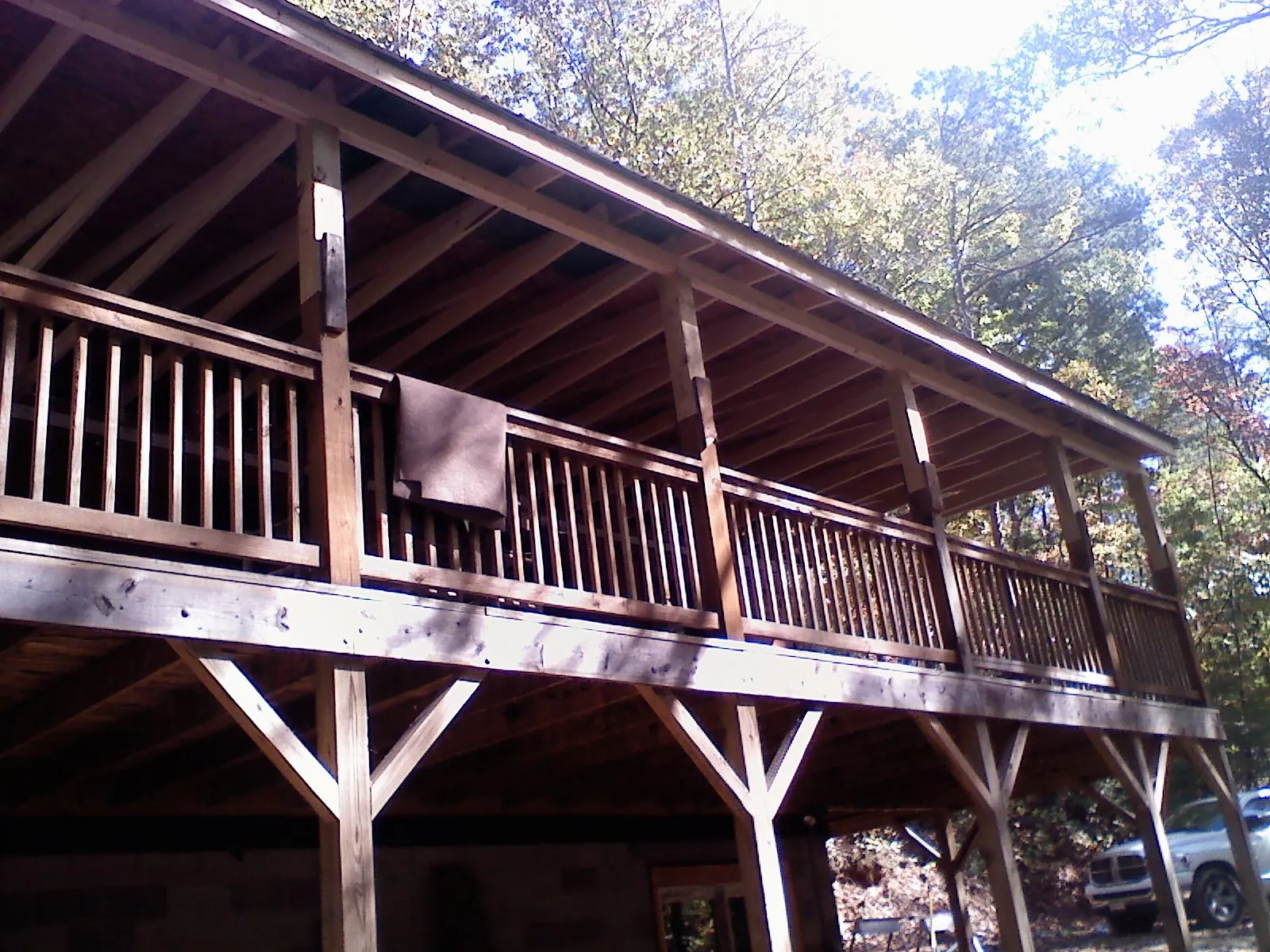 Timber framing under a new elevated porch and deck — Roof Leak Repair in Lorraine by Roofing Brothers